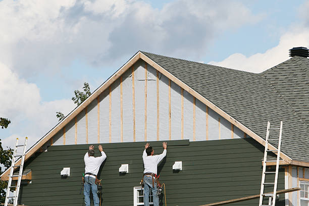 Professional Siding Contractor technician working in Fulton, NY